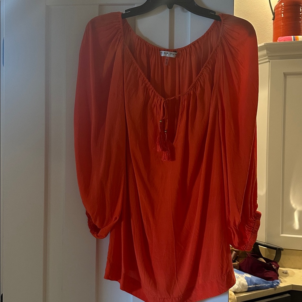 Trina Turk Orange Blouse with 3/4 length sleeves